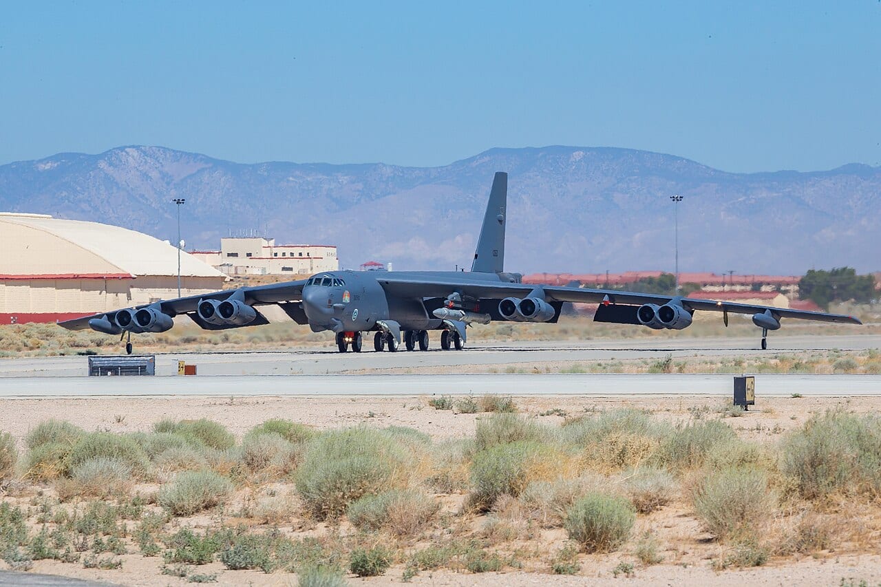A B-52H Stratofortress taking off from Edwards Air Force Base for a captive-carry hypersonic weapon flight test.